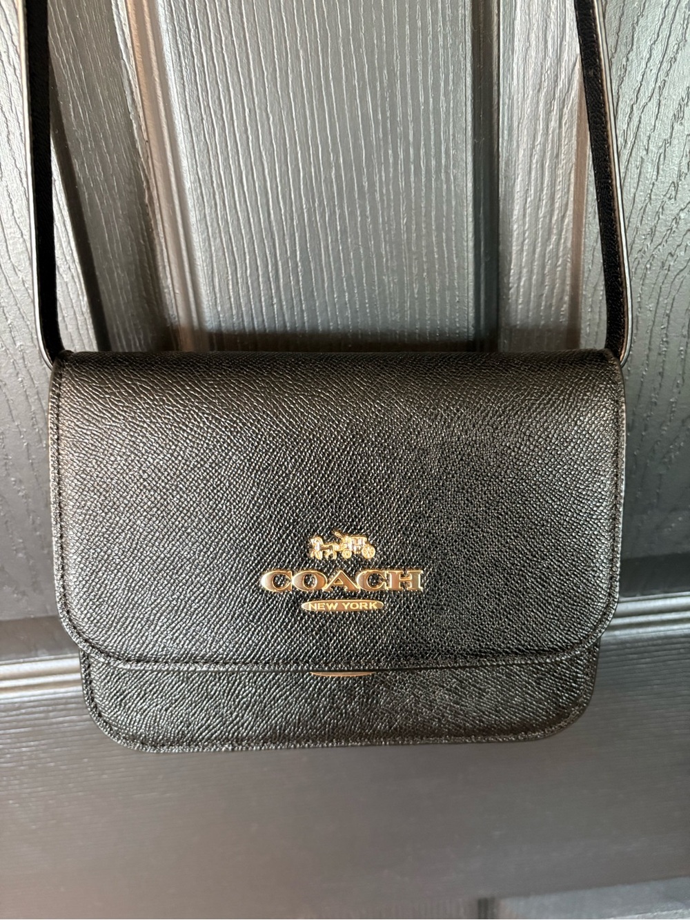 Coach Black Pebbled Leather Crossbody with Gold Logo